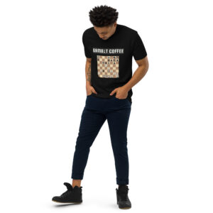 Man wearing a black Gambit Coffee chess puzzle T-Shirt.