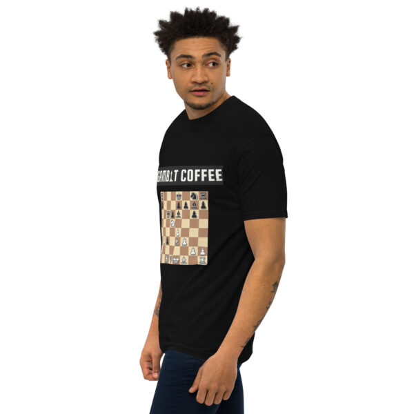 Man wearing a black Gambit Coffee chess puzzle T-Shirt.