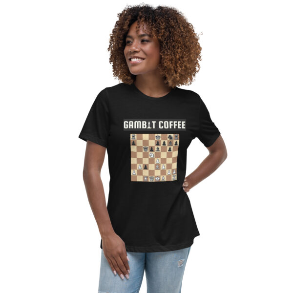 Woman wearing a black Gambit Coffee chess puzzle T-Shirt.