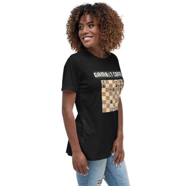 Woman wearing a black Gambit Coffee chess puzzle T-Shirt.