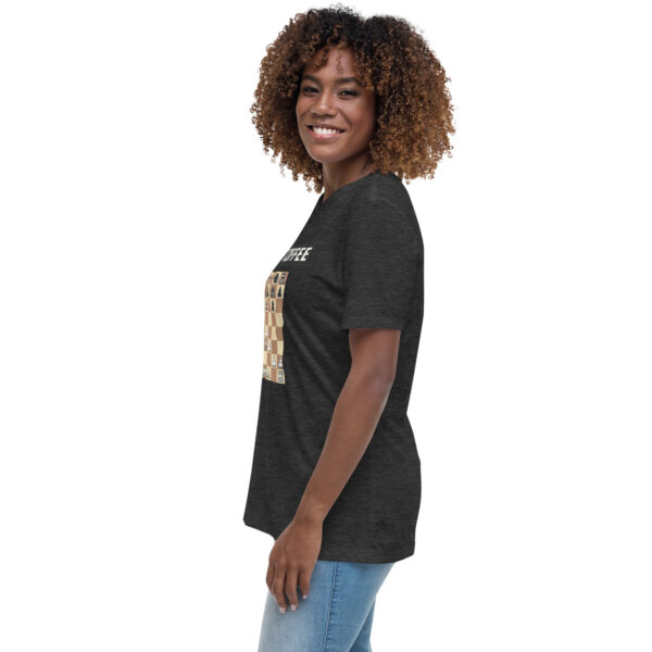 Woman wearing a black Gambit Coffee chess puzzle T-Shirt.