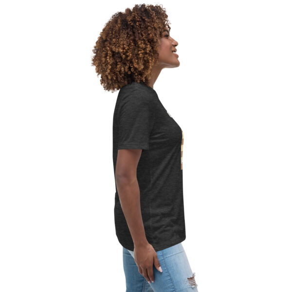 Woman wearing a black Gambit Coffee chess puzzle T-Shirt.