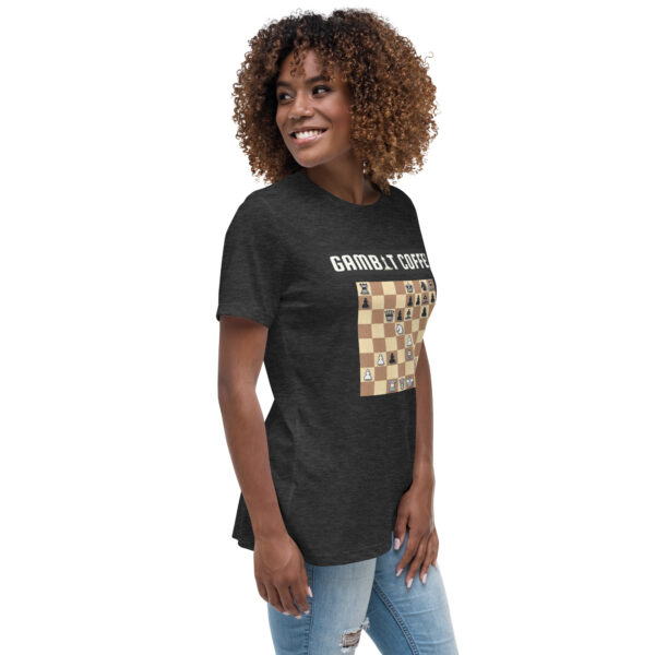 Woman wearing a black Gambit Coffee chess puzzle T-Shirt.