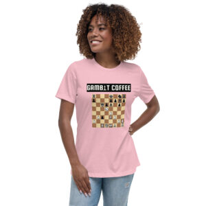 Woman wearing a pink Gambit Coffee chess puzzle T-Shirt.