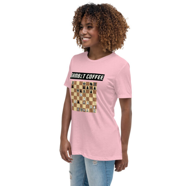 Woman wearing a pink Gambit Coffee chess puzzle T-Shirt.