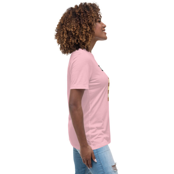 Woman wearing a pink Gambit Coffee chess puzzle T-Shirt.