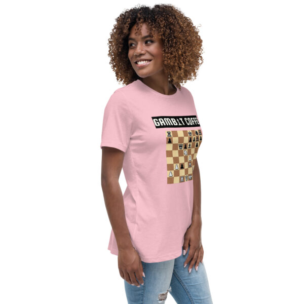 Woman wearing a pink Gambit Coffee chess puzzle T-Shirt.