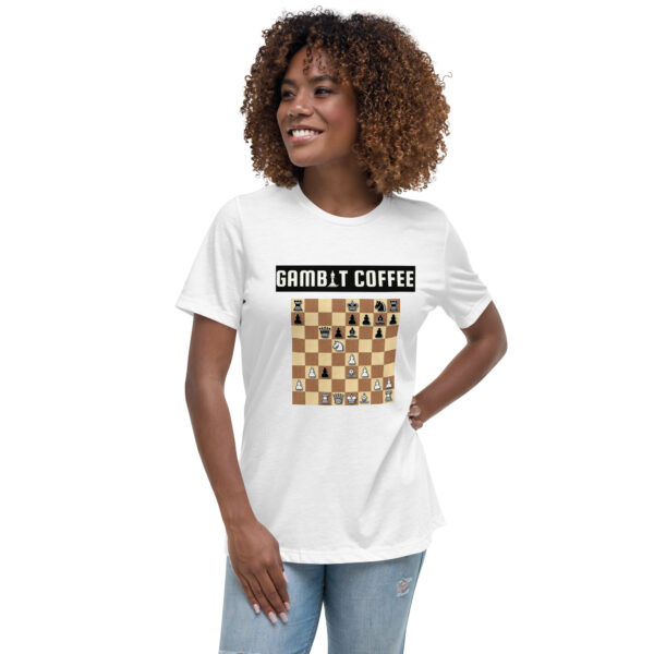 Woman wearing a white Gambit Coffee chess puzzle T-Shirt.