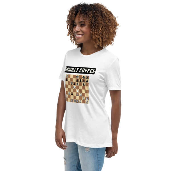 Woman wearing a white Gambit Coffee chess puzzle T-Shirt.