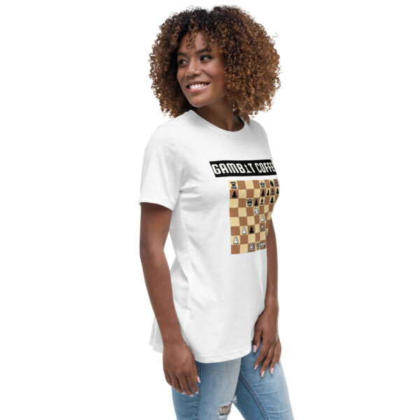 Woman wearing a white Gambit Coffee chess puzzle T-Shirt.